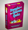 A box of 'People of the Quran Quiz Cards' with a vibrant purple and pink design, featuring multiple-choice questions on the back of the cards.